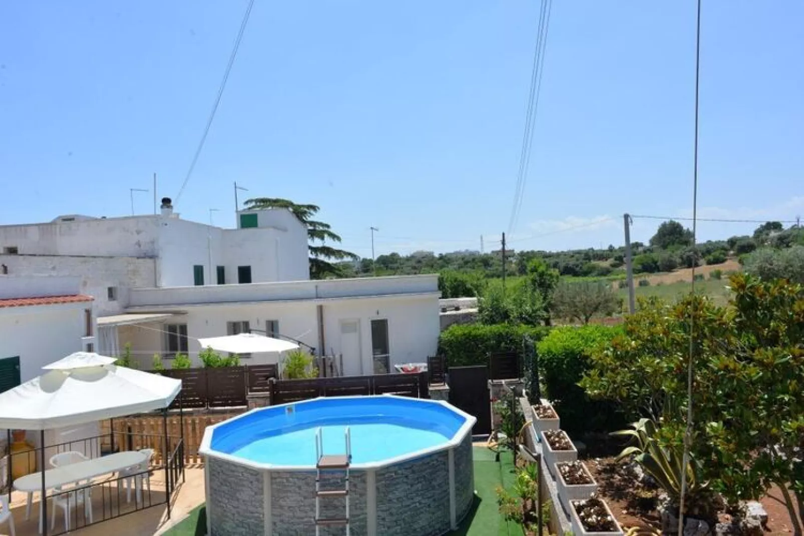 Trullo Cittadino Cisternino-Gardens summer