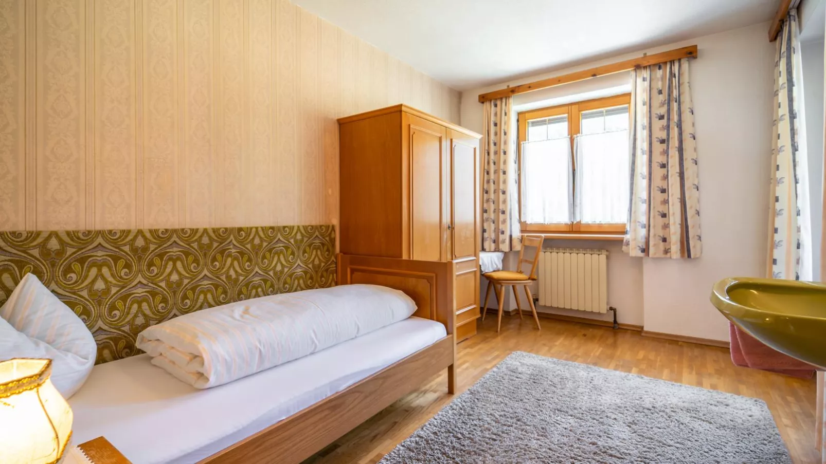 Tiroler Gästehaus-Schlafzimmer