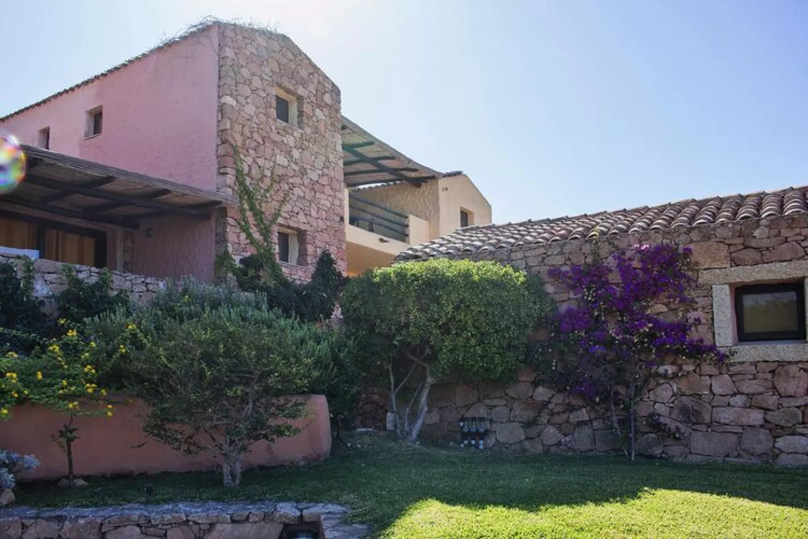 Holiday residence I Cormorani, Baja Sardinia-50 qm-Jardin d'été