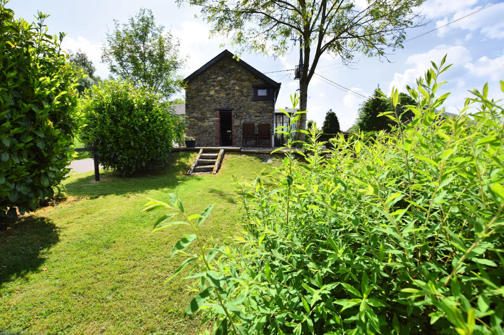 Maison des Contes-Gardens summer