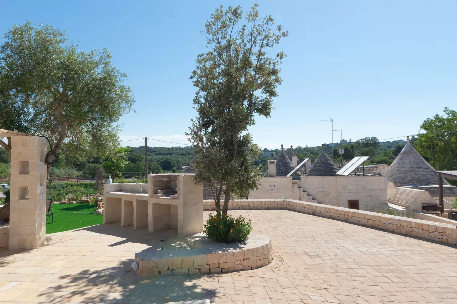 Trulli Cesare in Locorotondo-Gardens summer
