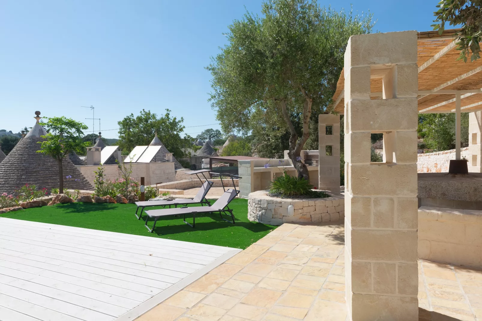 Trulli Cesare in Locorotondo-Gardens summer