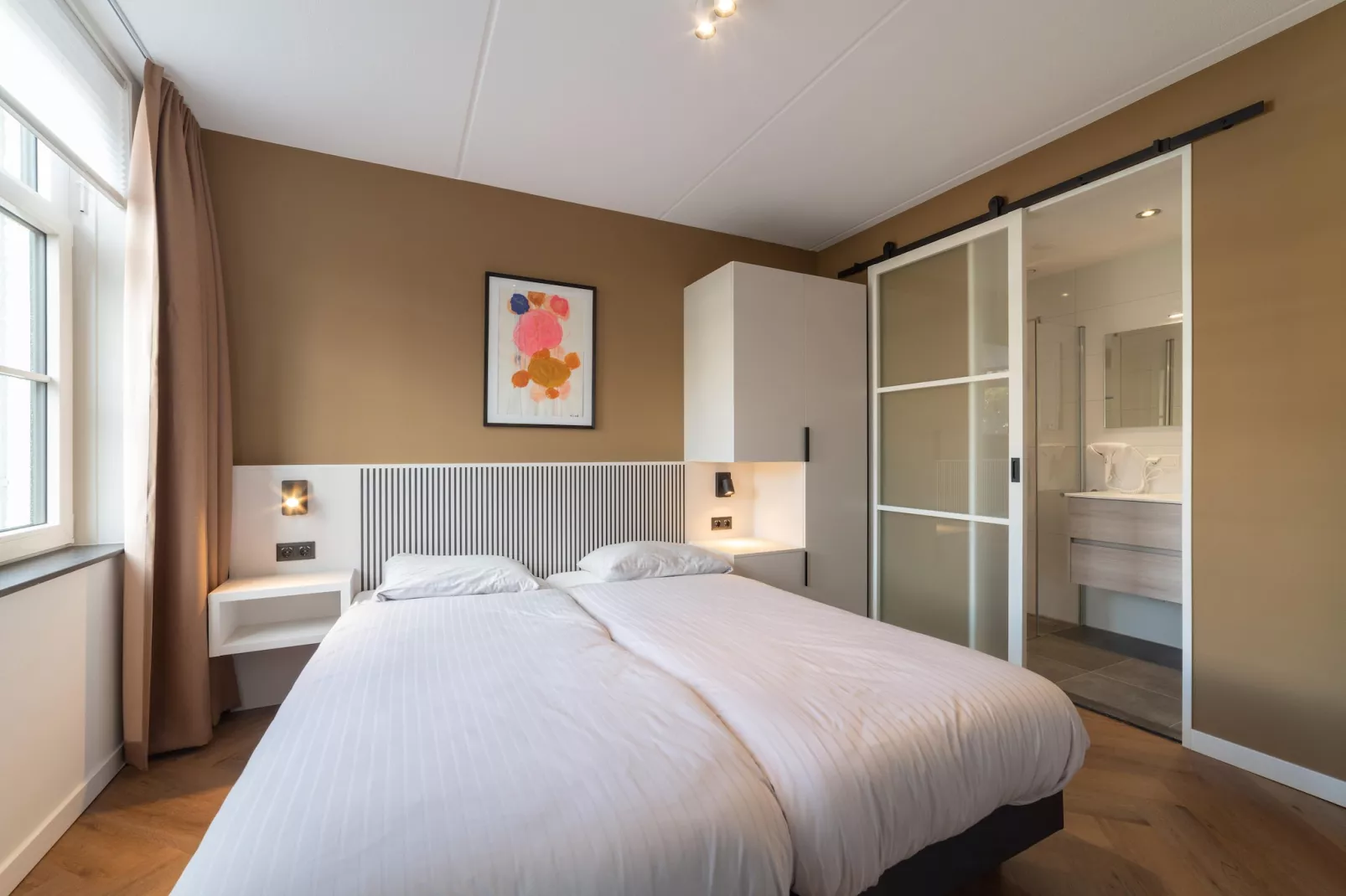 12 persoons Stadvilla met Jacuzzi-Chambre