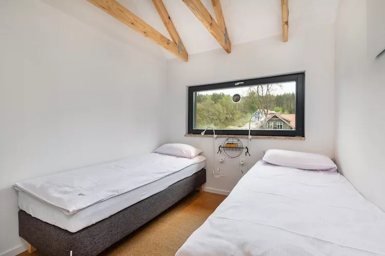 Dom wakacyjny dla 3 osób nad jeziorem Wisełka-Bedroom