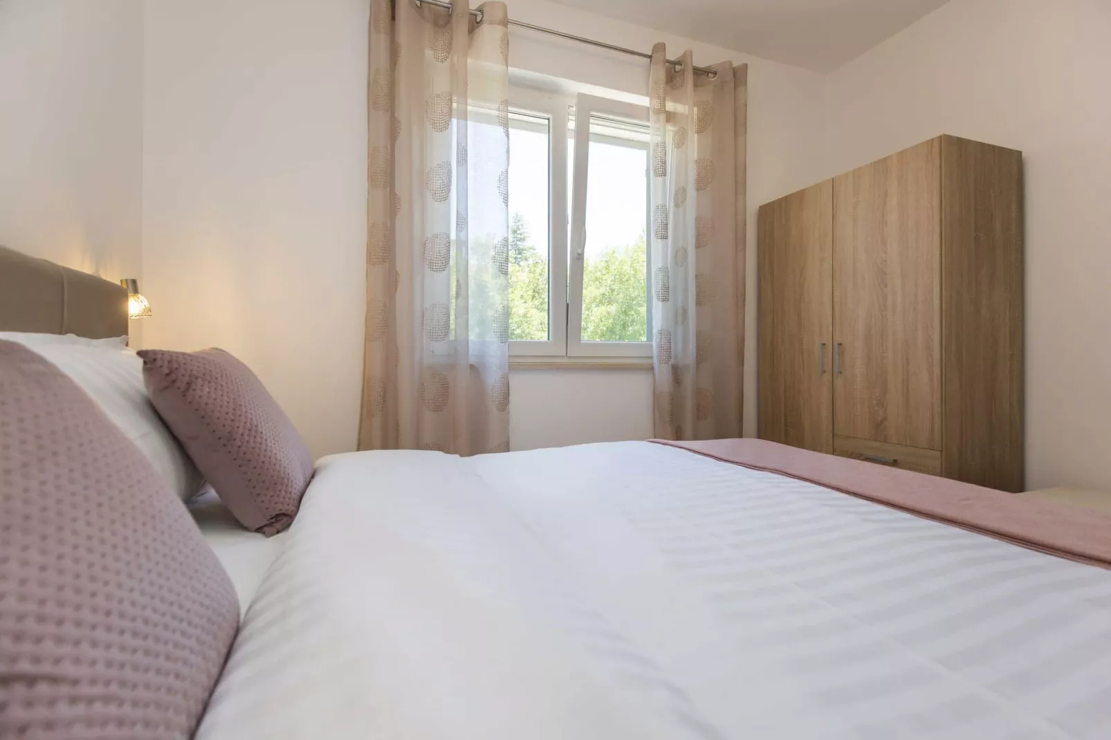 Apartment Mirna with Pool and Lovely Garden-Bedroom