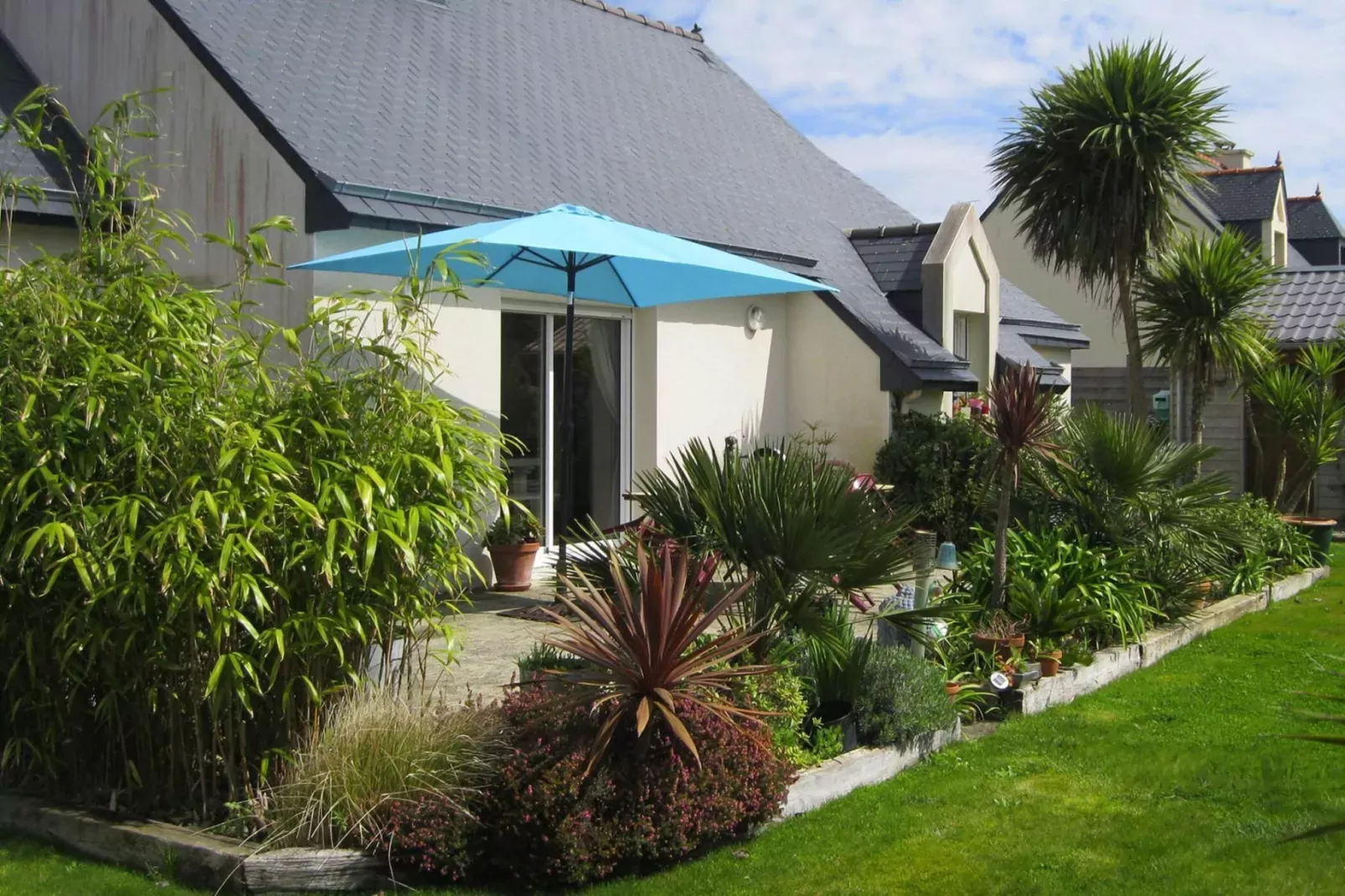 Pretty holiday home in palm garden near coast Pleubian-Exterior summer