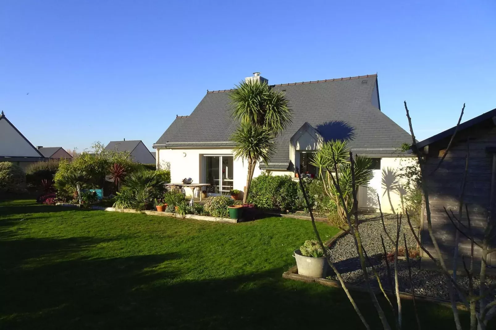 Pretty holiday home in palm garden near coast Pleubian-Exterior summer