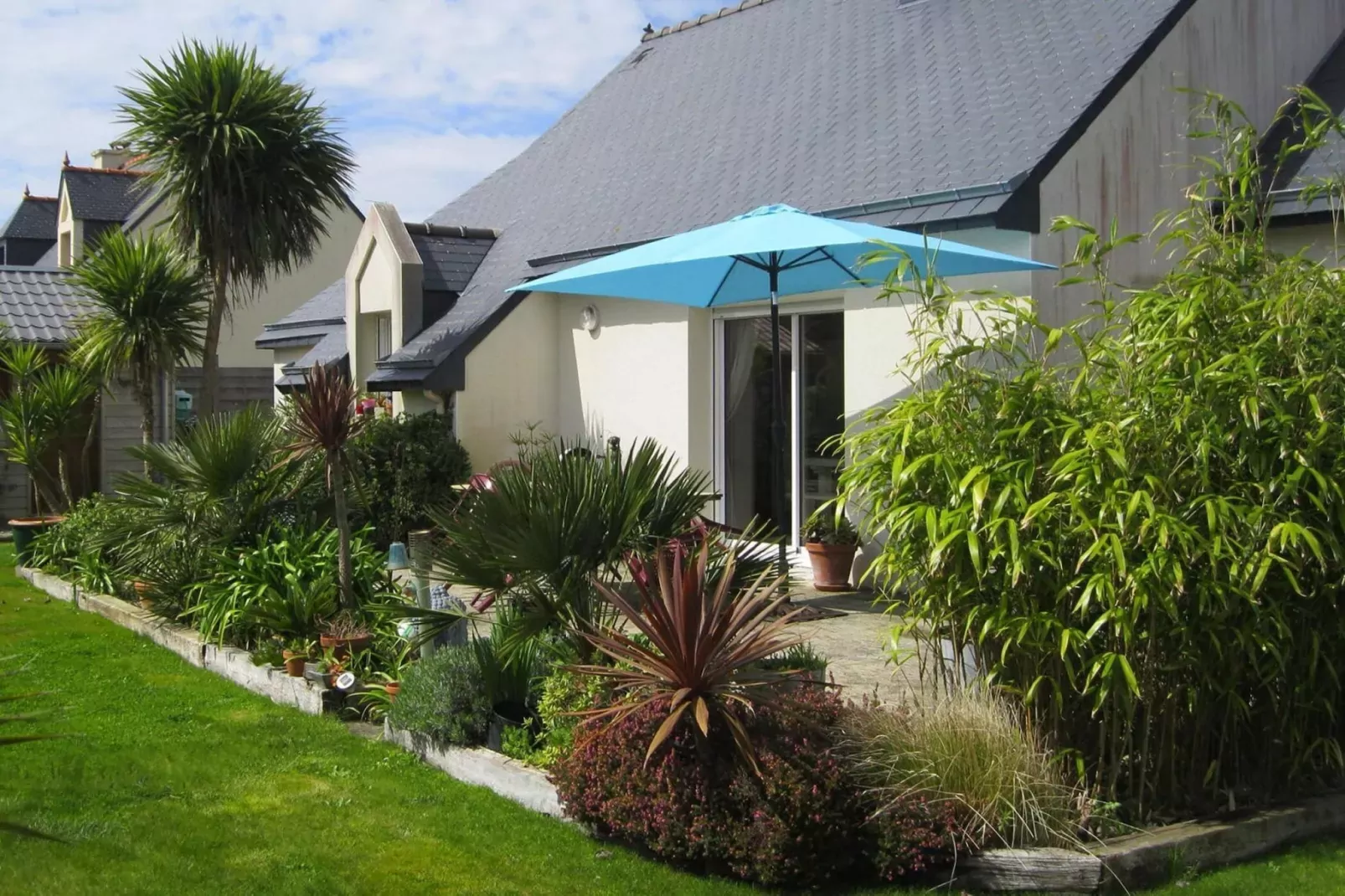 Pretty holiday home in palm garden near coast Pleubian-Exterior summer
