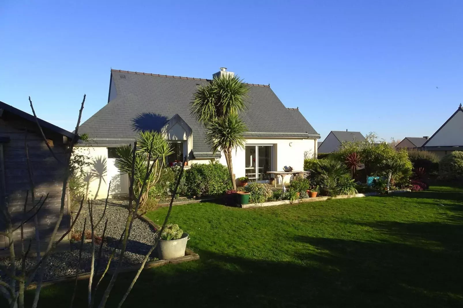 Pretty holiday home in palm garden near coast Pleubian-Exterior summer
