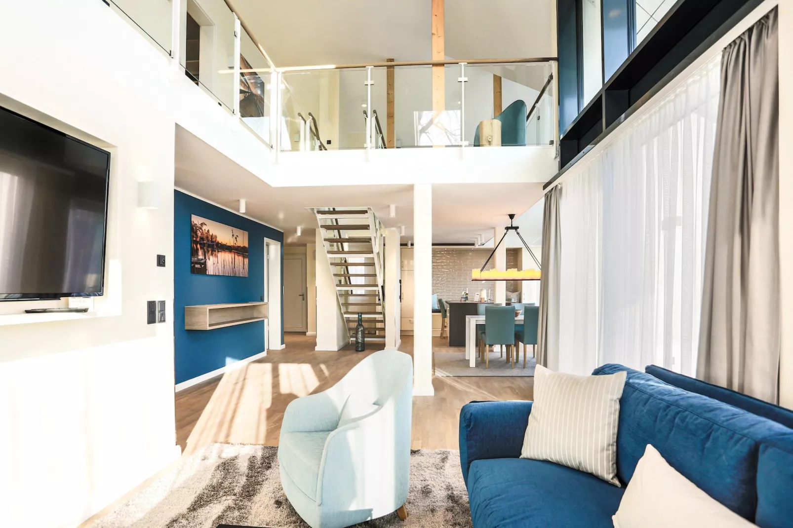 Apartments im MAREMÜRITZ Yachthafen Resort & Spa / Mare Grand Maisonette Suite 3 Erwachsene und 1 Kind 3-15 Jahre-Living room