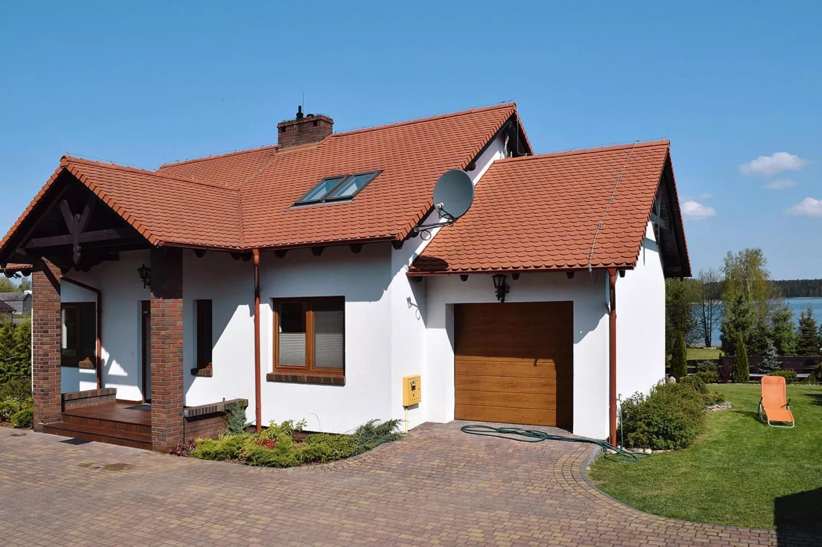 Holiday home at the lake in Kiedrowice-Exterior summer