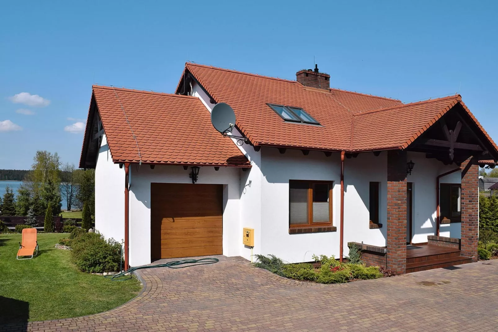 Holiday home at the lake in Kiedrowice-Exterior summer