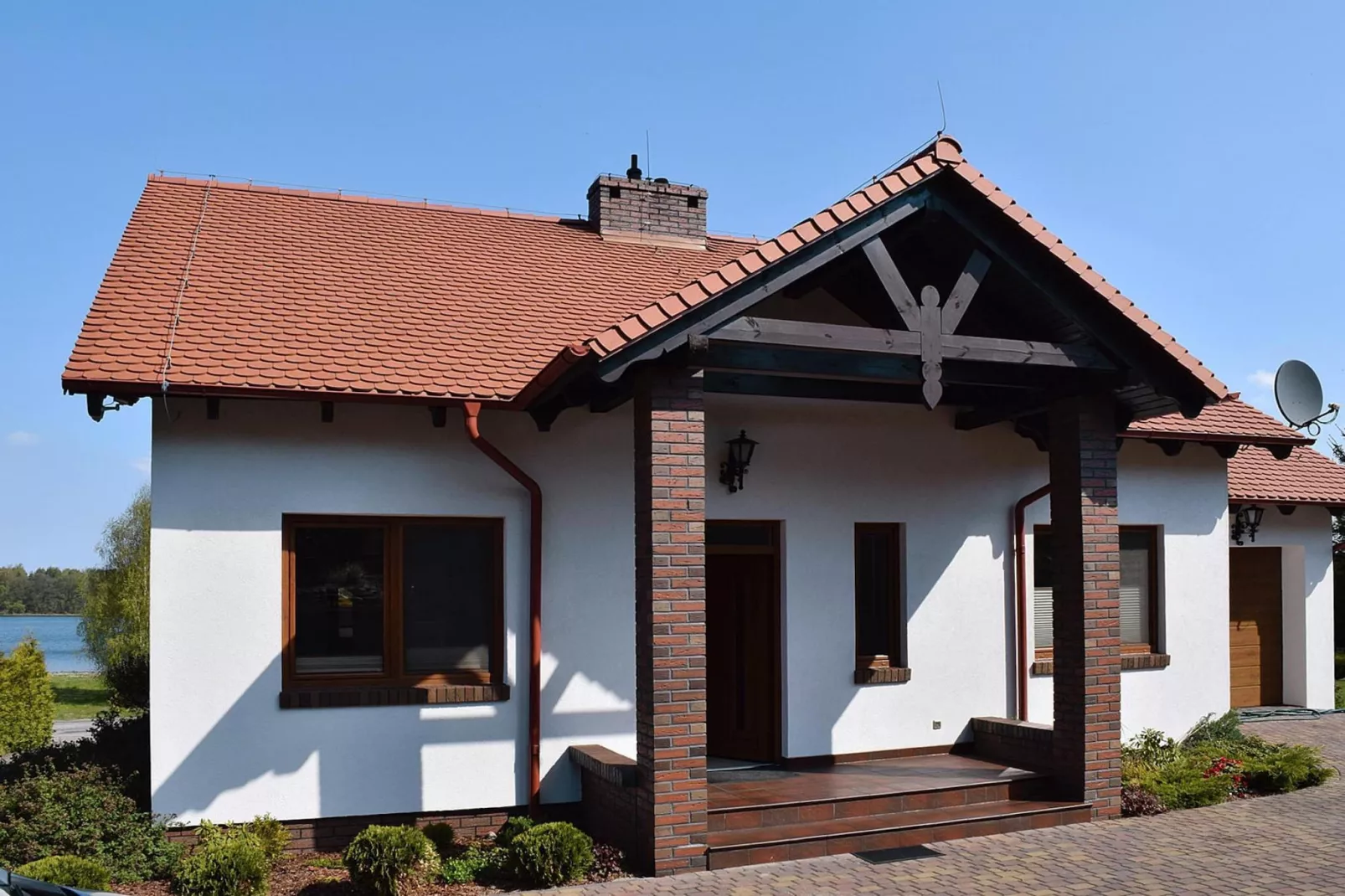 Holiday home at the lake in Kiedrowice-Exterior summer