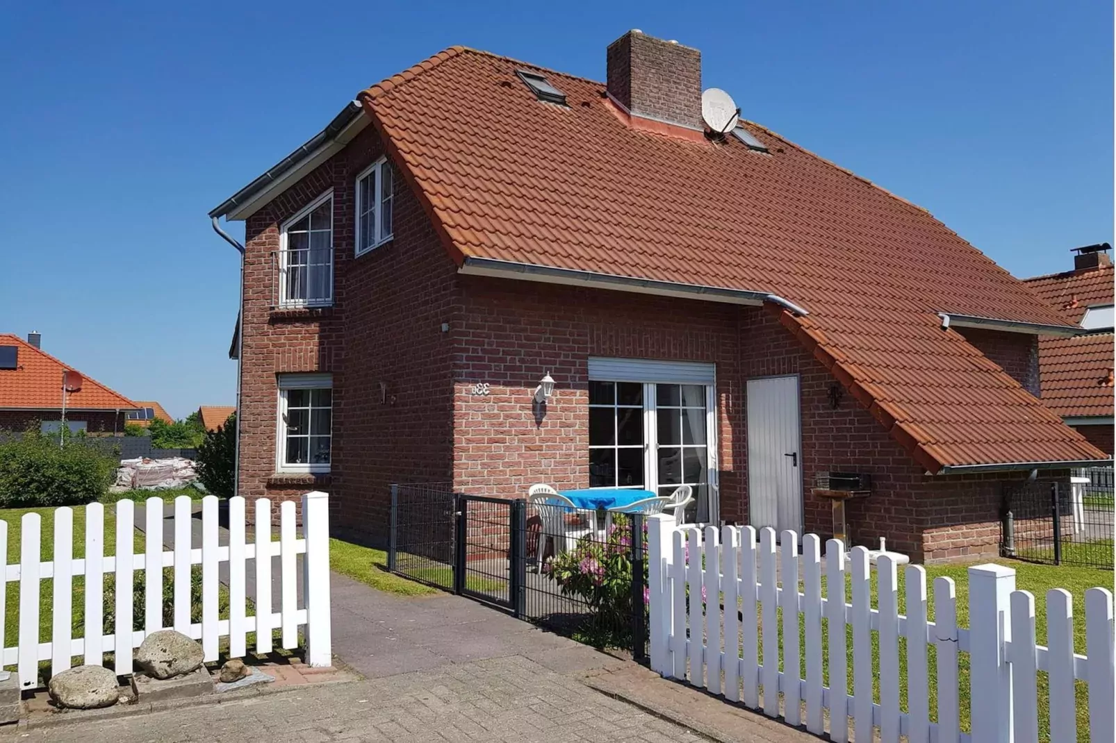 Doppelhaushälfte Friesenglück Neßmersiel-Exterior summer