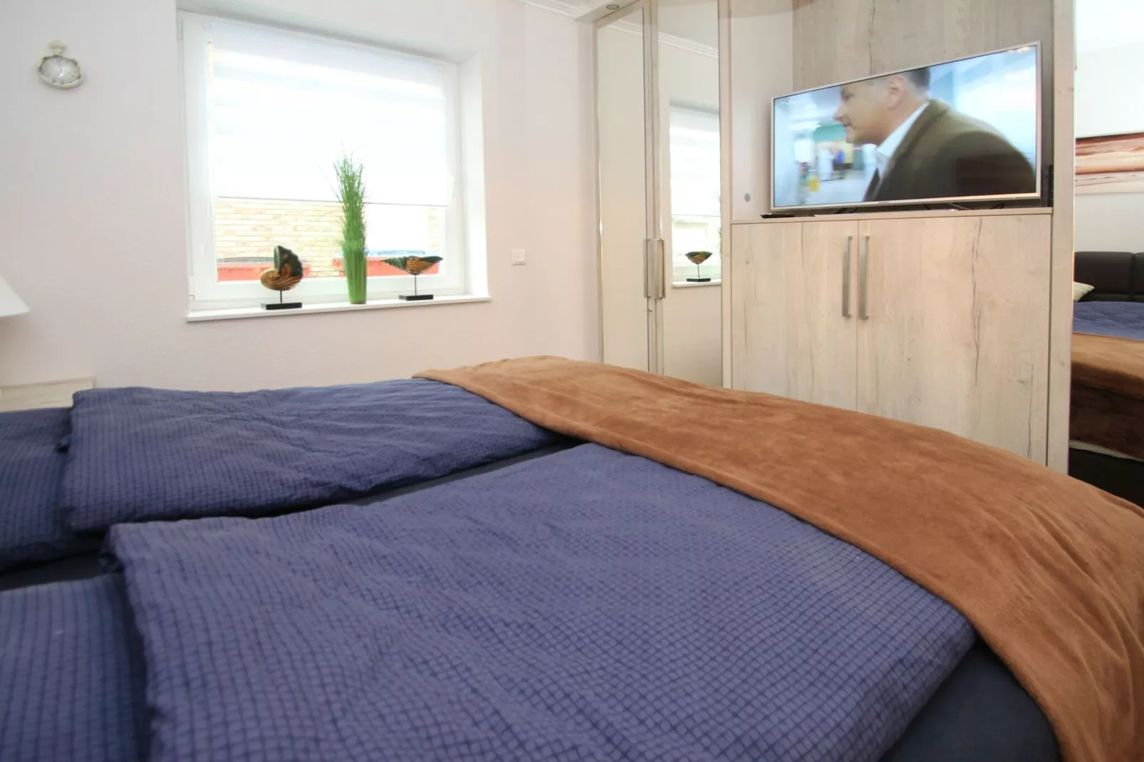 Gemütliche Nordsee-Wohnung in Neßmersiel mit Garten und Feldblick-Bedroom
