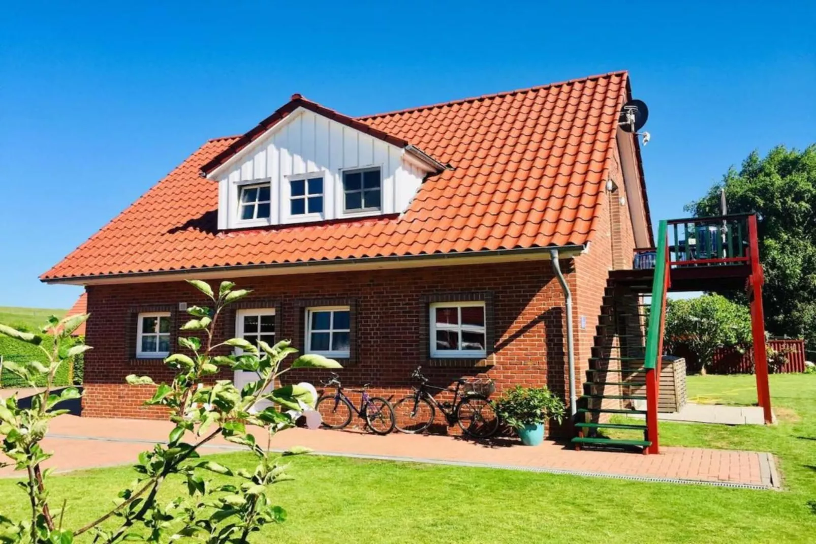 Gemütliche Nordsee-Wohnung in Neßmersiel mit Garten und Feldblick-Areas summer 5km