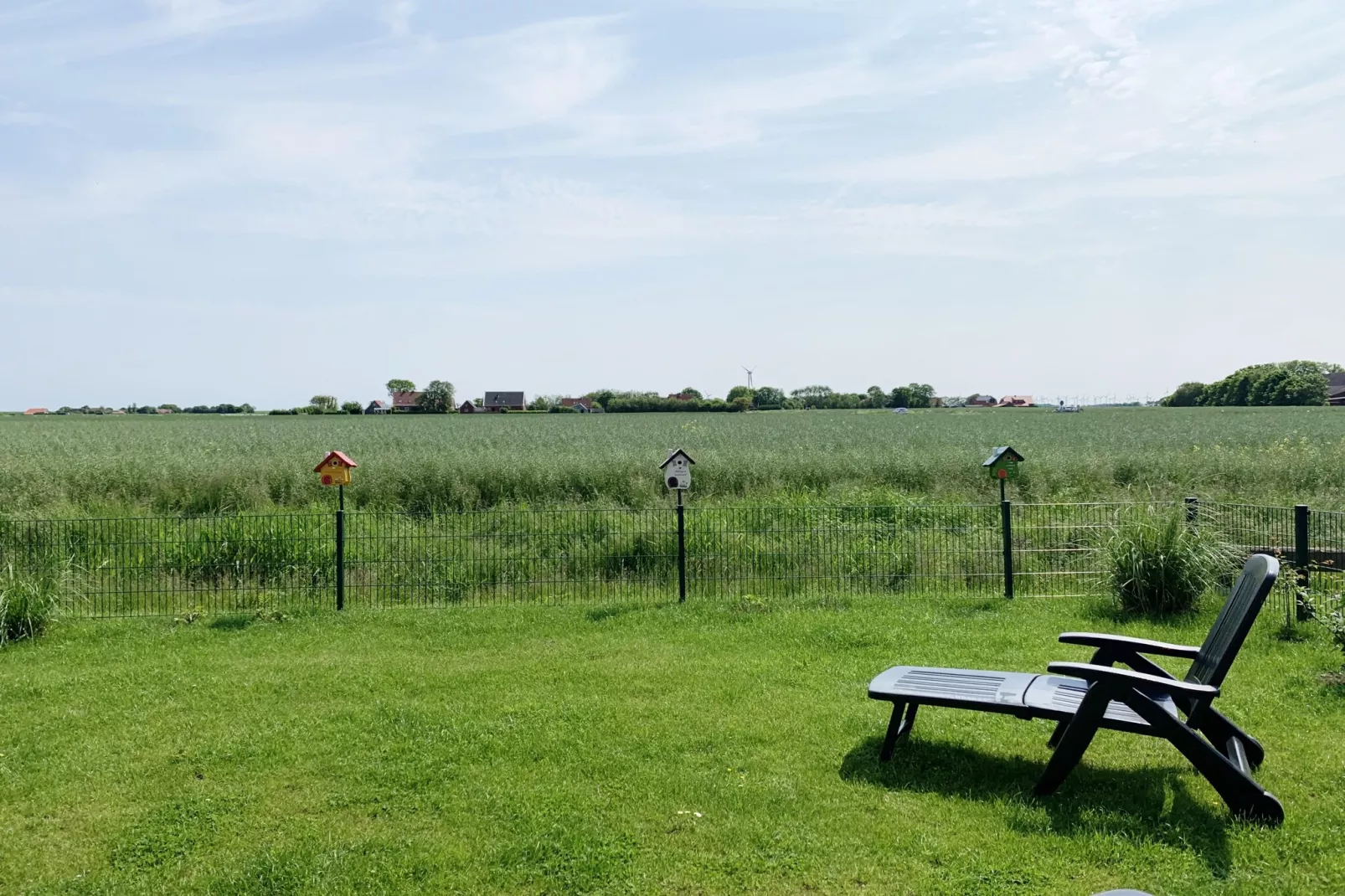 Gemütliche Nordsee-Wohnung in Neßmersiel mit Garten und Feldblick-View