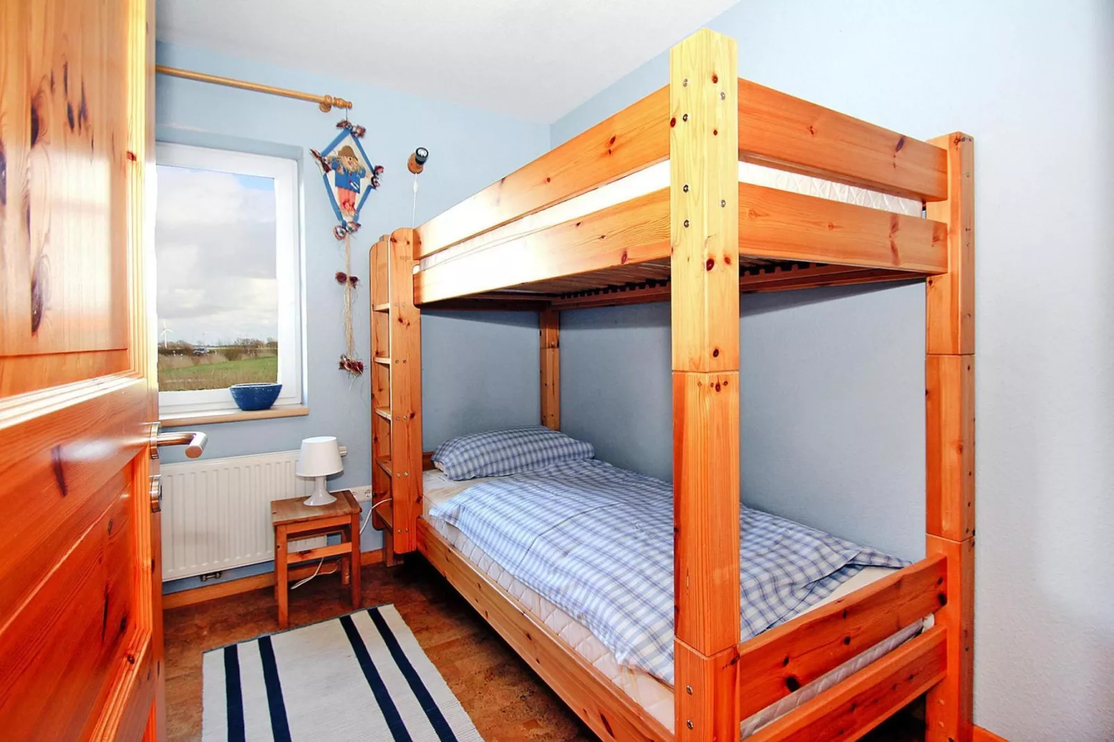 Großes Ferienhaus am Deichtor in Neßmersiel-Bedroom