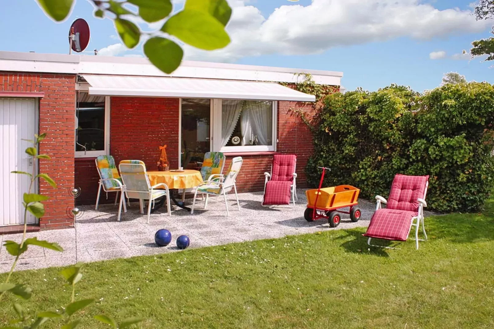 Ferienbungalow Klönsnack in Dornumersiel-Jardin d'été