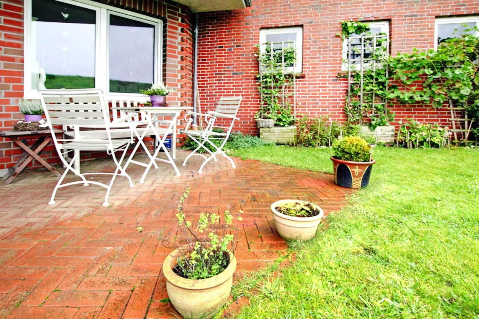 Ferienwohnung Kapitänskajüte-Gärten Sommer