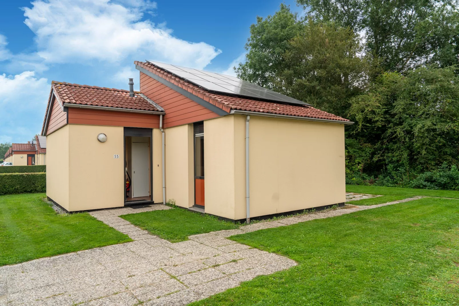Gelijkvloerse vakantiewoning 6p huisje 17-Außenbereich Sommer