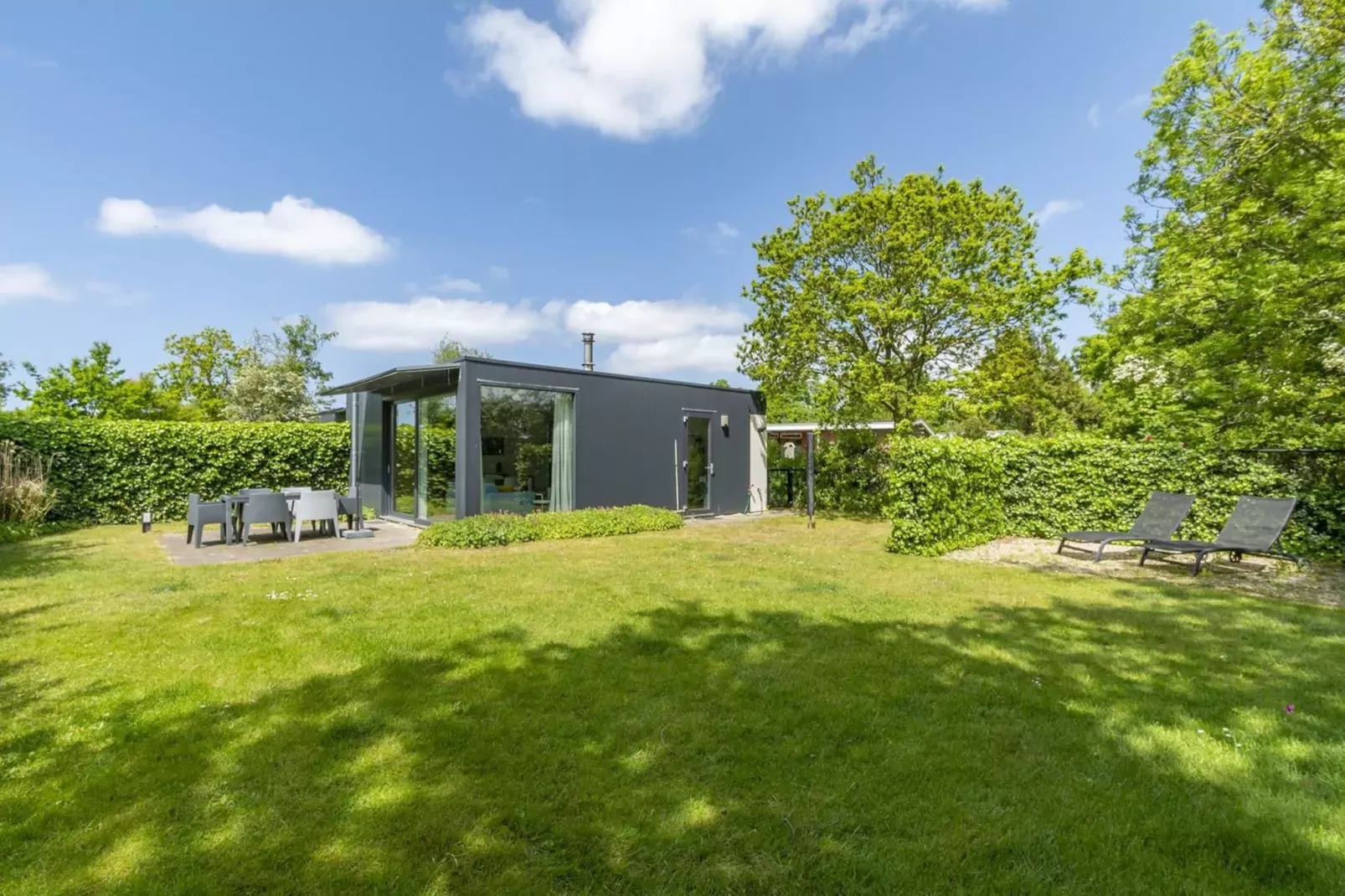 Strandhuis Uitwaayer-Jardin d'été