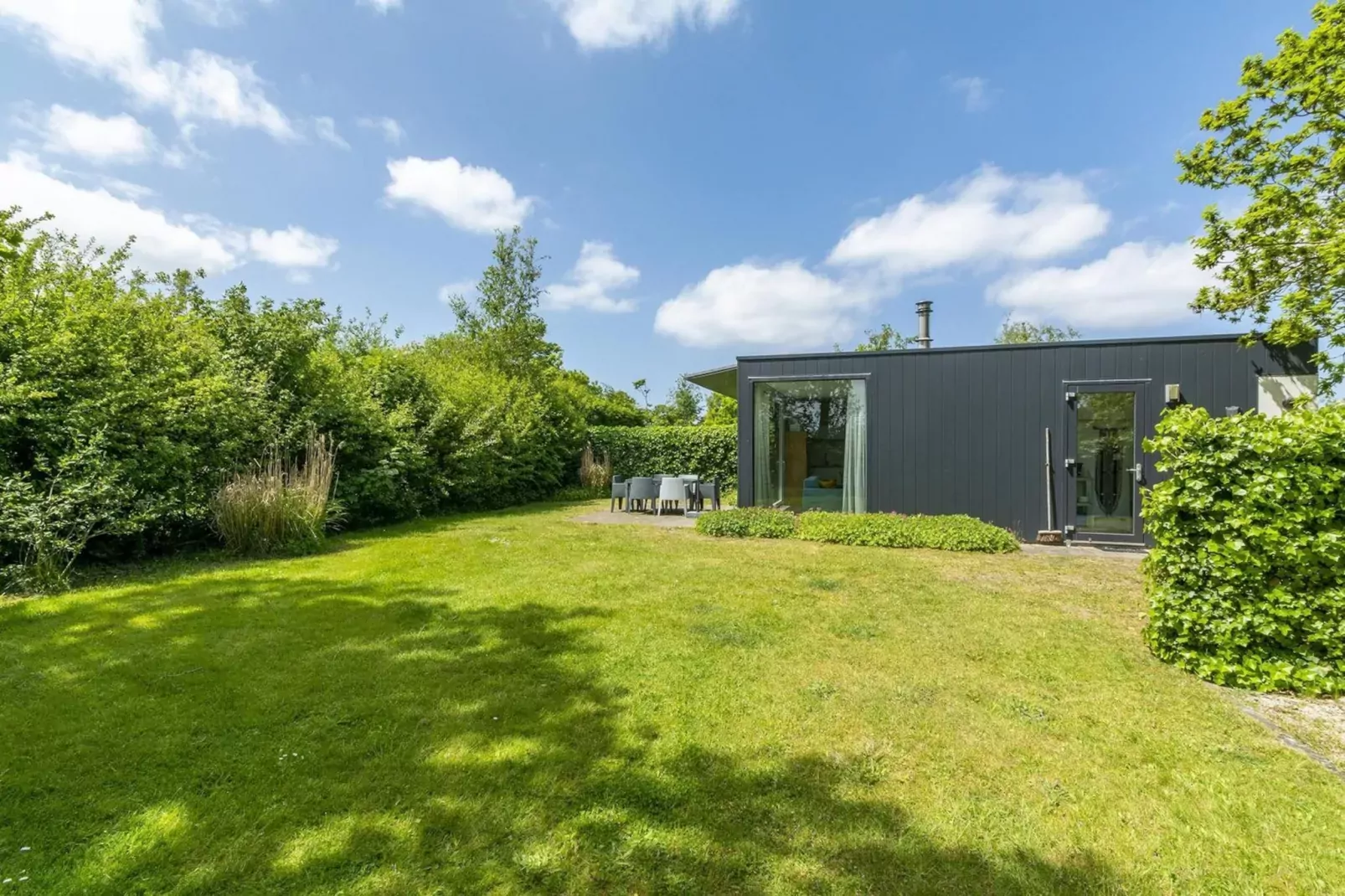 Strandhuis Uitwaayer-Jardin d'été
