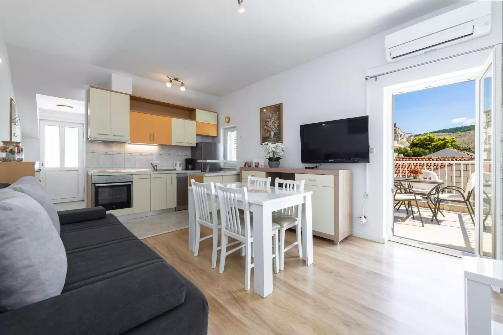 Green Hills Apartment - One Bedroom Apartment with Balcony and Sea View-Living room