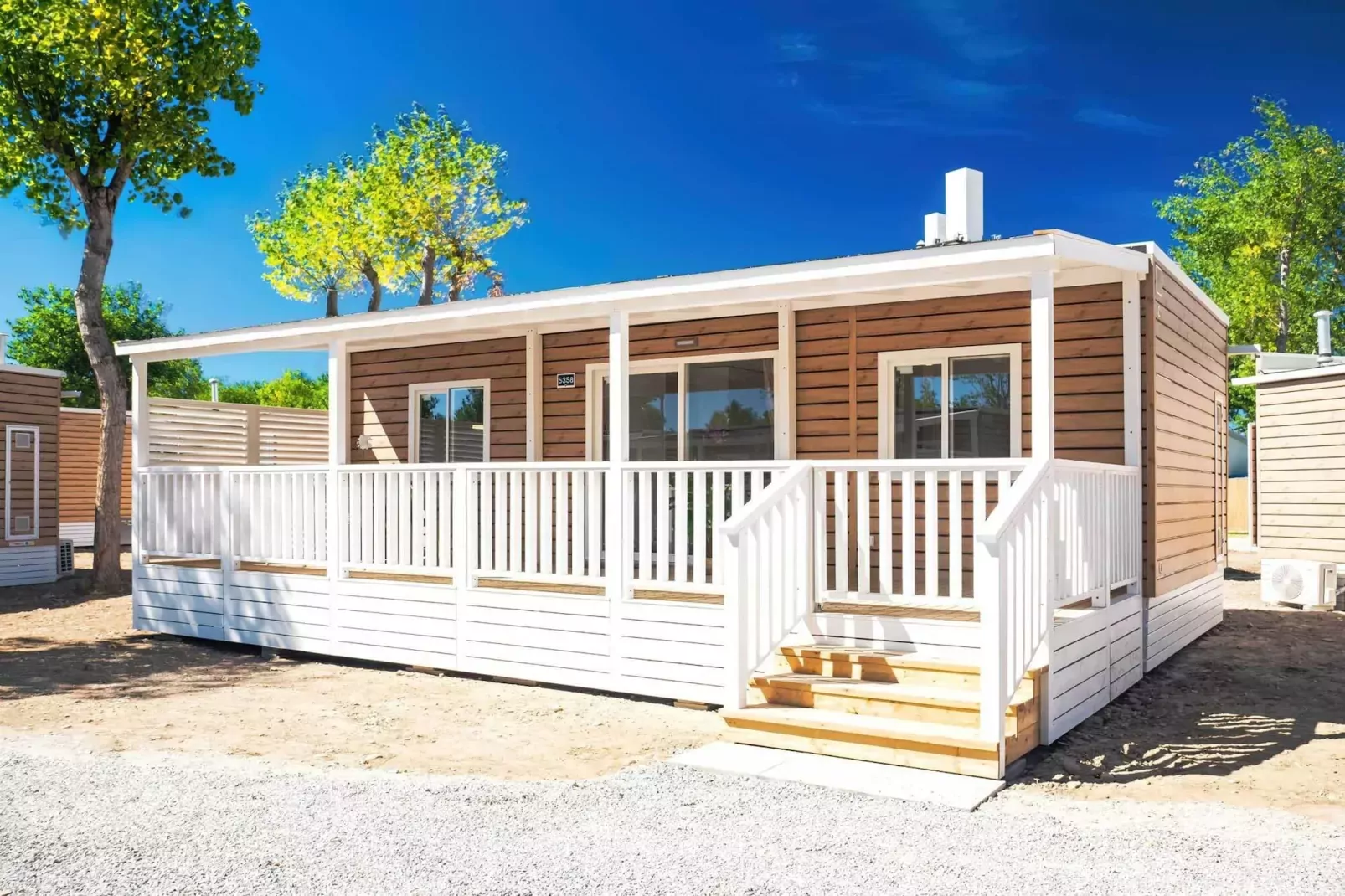 Rimini Family Village Viserba Rimini - Lodge Deluxe 4 plus 1 pax-Außenbereich Sommer
