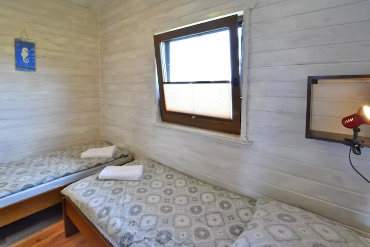 Parterowe domki wakacyjne dla max 3 osób w Bobolinie-Schlafzimmer