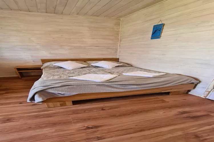 Parterowe domki wakacyjne dla max 4 osób w Bobolinie-Wohnzimmer