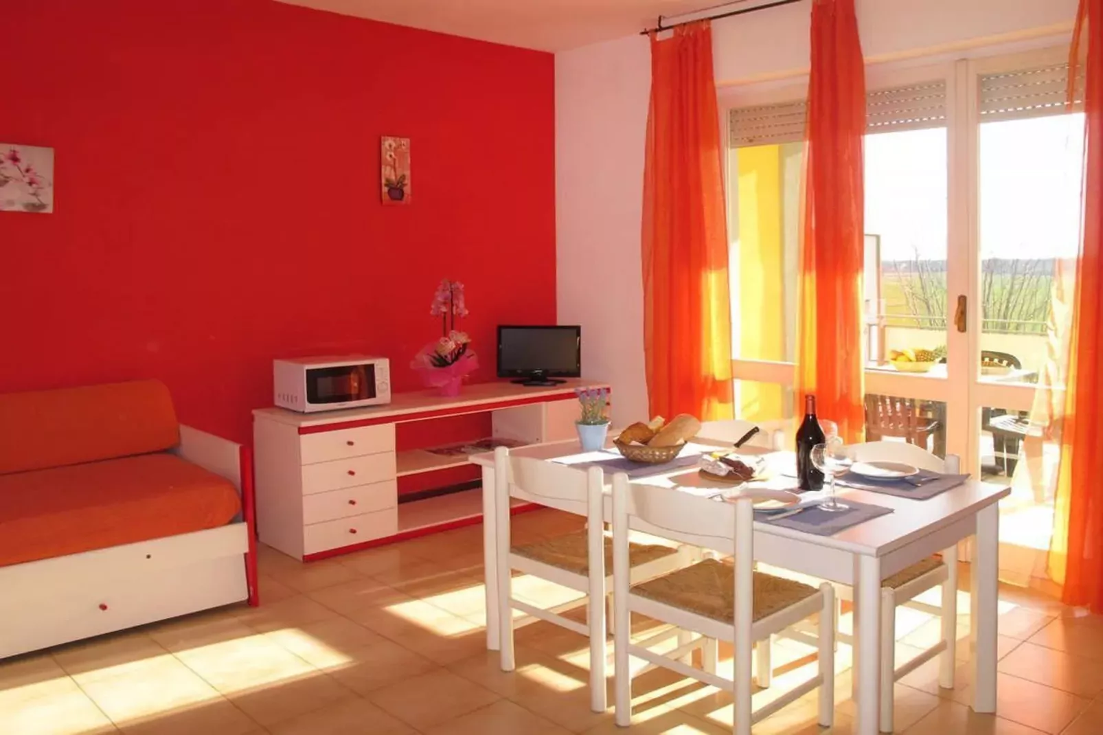 Residenza Alberghiera Italia in Luni - Bilocale B4-Wohnzimmer