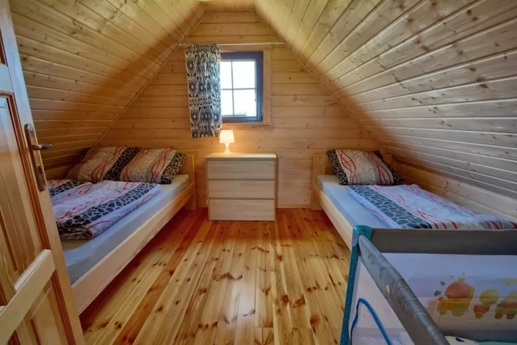 Piętrowe domki wakacyjne dla max 6 osób Mielenko-Schlafzimmer