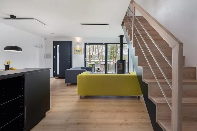 Domy wakacyjne dla 2 osób nad jeziorem Wisełka-Wohnzimmer