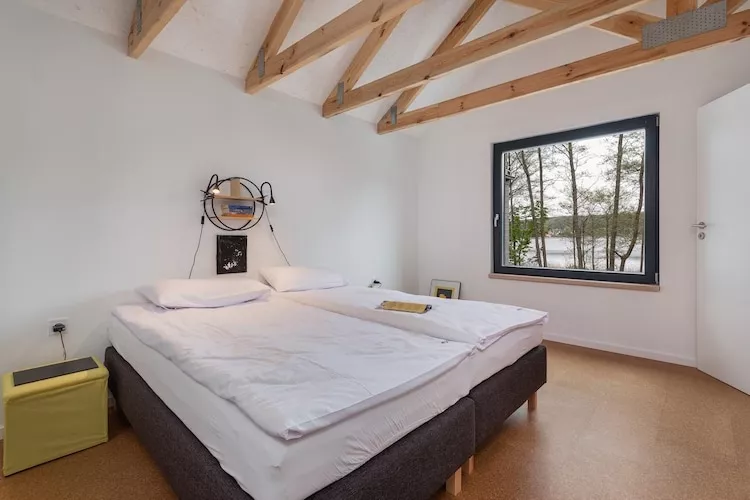 Domy wakacyjne dla 2 osób nad jeziorem Wisełka-Schlafzimmer