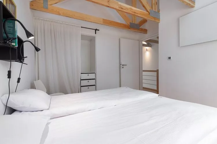 Domy wakacyjne dla 2 osób nad jeziorem Wisełka-Schlafzimmer