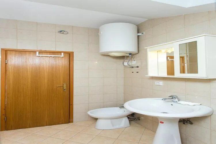 Apartments Villa Maslina - Two Bedroom Apartment with Terrace and Garden View-Bedroom