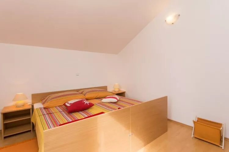 Apartments Villa Maslina - Two Bedroom Apartment with Terrace and Garden View-Bedroom