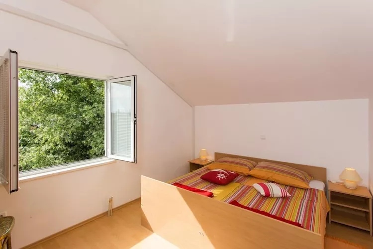 Apartments Villa Maslina - Two Bedroom Apartment with Terrace and Garden View-Bedroom