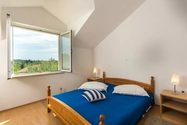 Apartments Villa Maslina - Two Bedroom Apartment with Terrace and Garden View-Bedroom