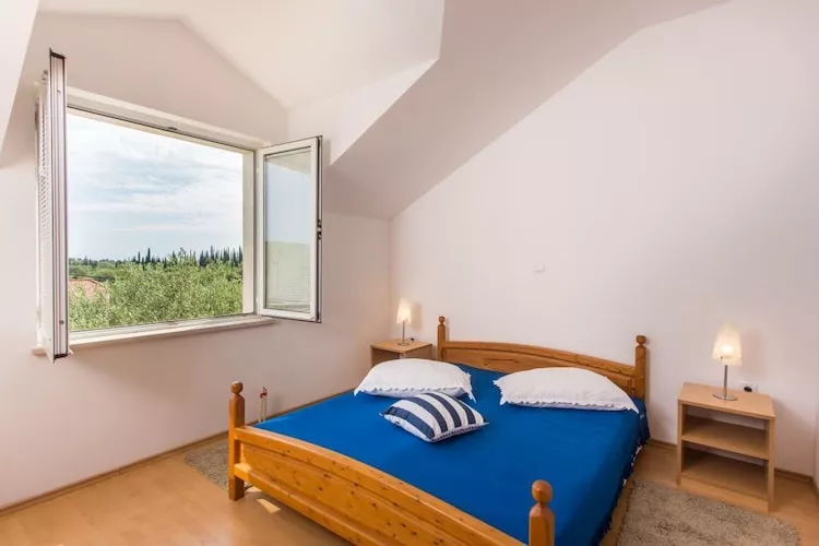 Apartments Villa Maslina - Two Bedroom Apartment with Terrace and Garden View-Bedroom