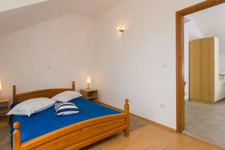 Apartments Villa Maslina - Two Bedroom Apartment with Terrace and Garden View-Bedroom