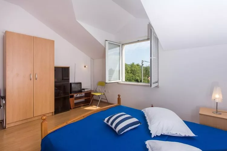 Apartments Villa Maslina - Two Bedroom Apartment with Terrace and Garden View-Bedroom
