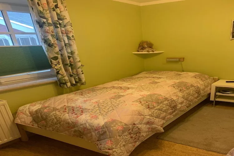 Haus Deichsfenne - Wohnung 2 / 3 Personen-Bedroom