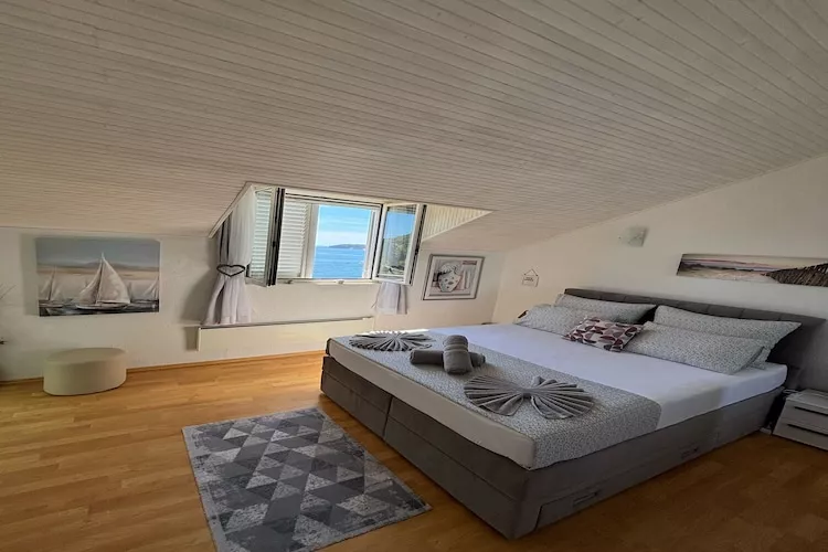 Indy's Beach Apartments -Two Bedroom Apartment with Balcony and Sea View-Bedroom