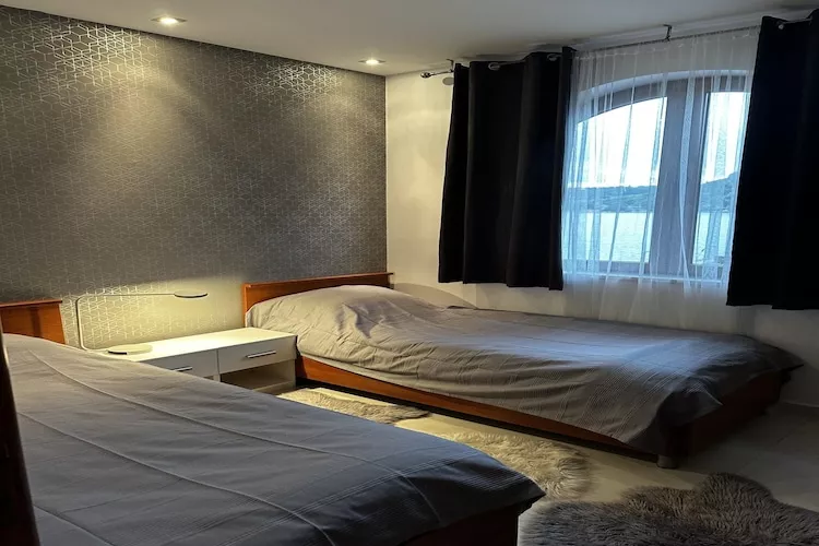 Apartment Frankie's Place - Two-Bedroom Apartment with Terrace and Sea View-Bedroom
