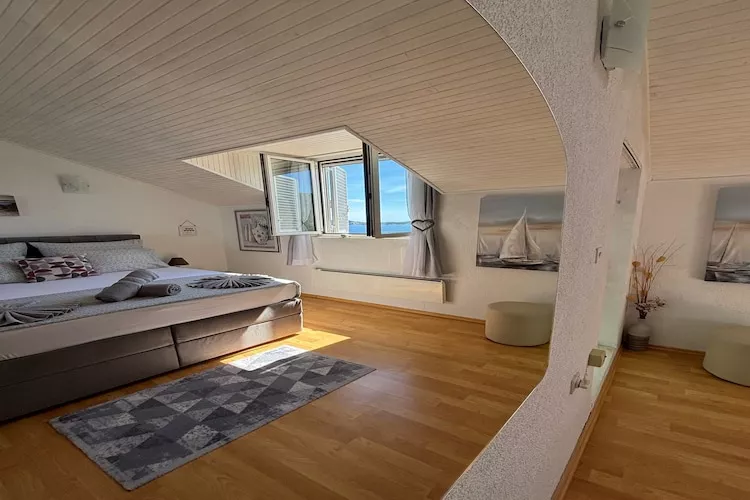 Indy's Beach Apartments -Two Bedroom Apartment with Balcony and Sea View-Bedroom