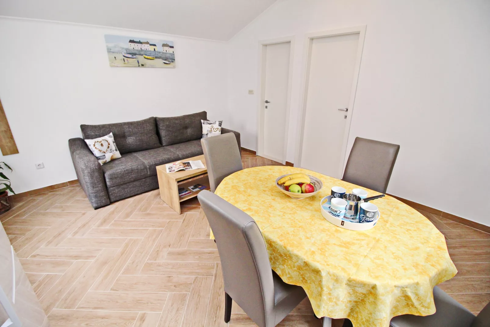 Apartments Memunić - Standard One Bedroom Apartment with Partial Sea View (NOVI)-Dining room