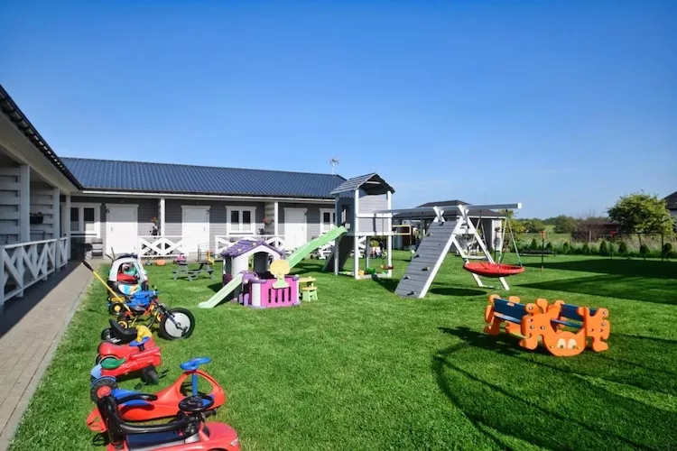 	Parterowe domki wakacyjne dla 5 osób Sarbinowo-Jardin d'été