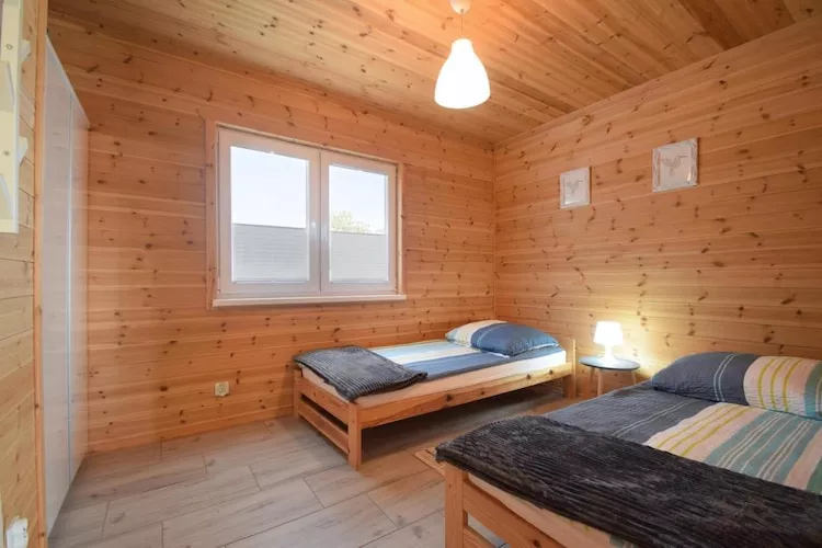 Parterowe domki wakacyjne dla 4 osób Sarbinowo-Schlafzimmer